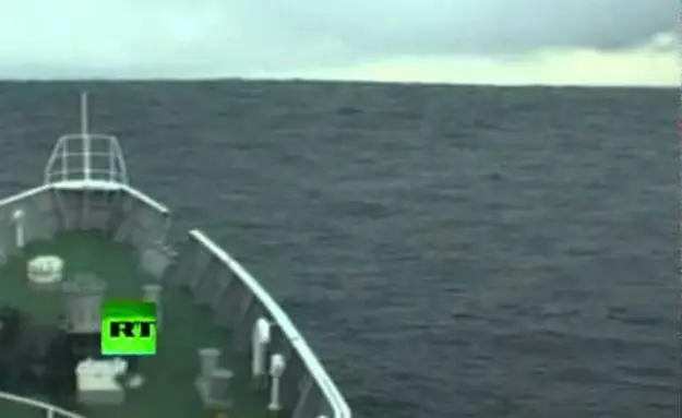 Ship Climbs Into Tsunami Waves