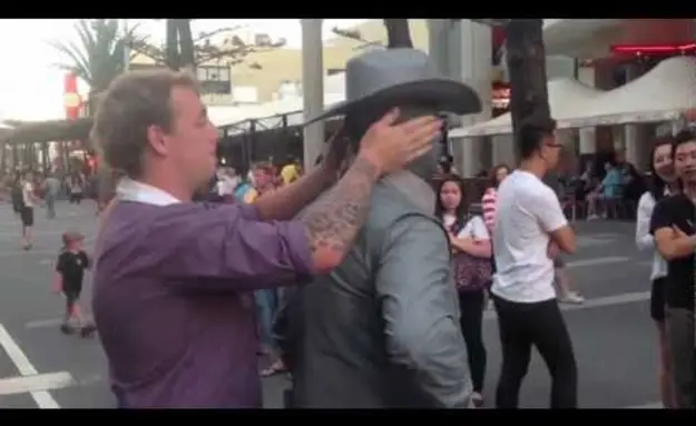 Street Performer Punches Obnoxious Guy